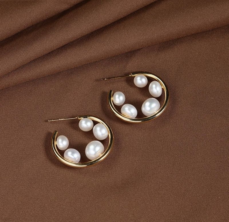 Aretes de perla sobrechapado en cobre y plata 925