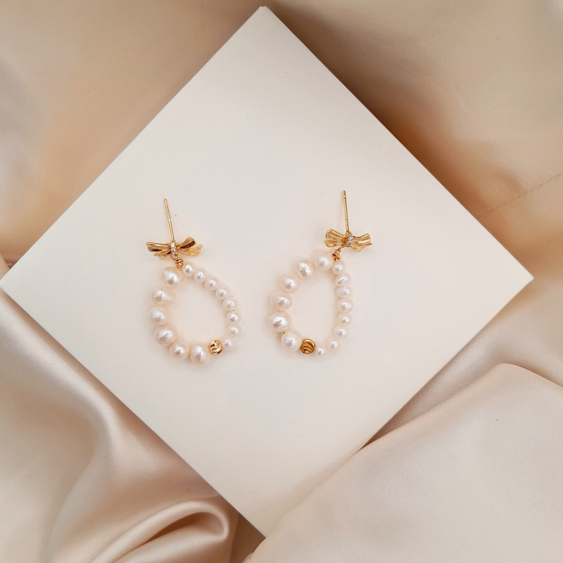Aretes de perla natural con mariposa y plata 925