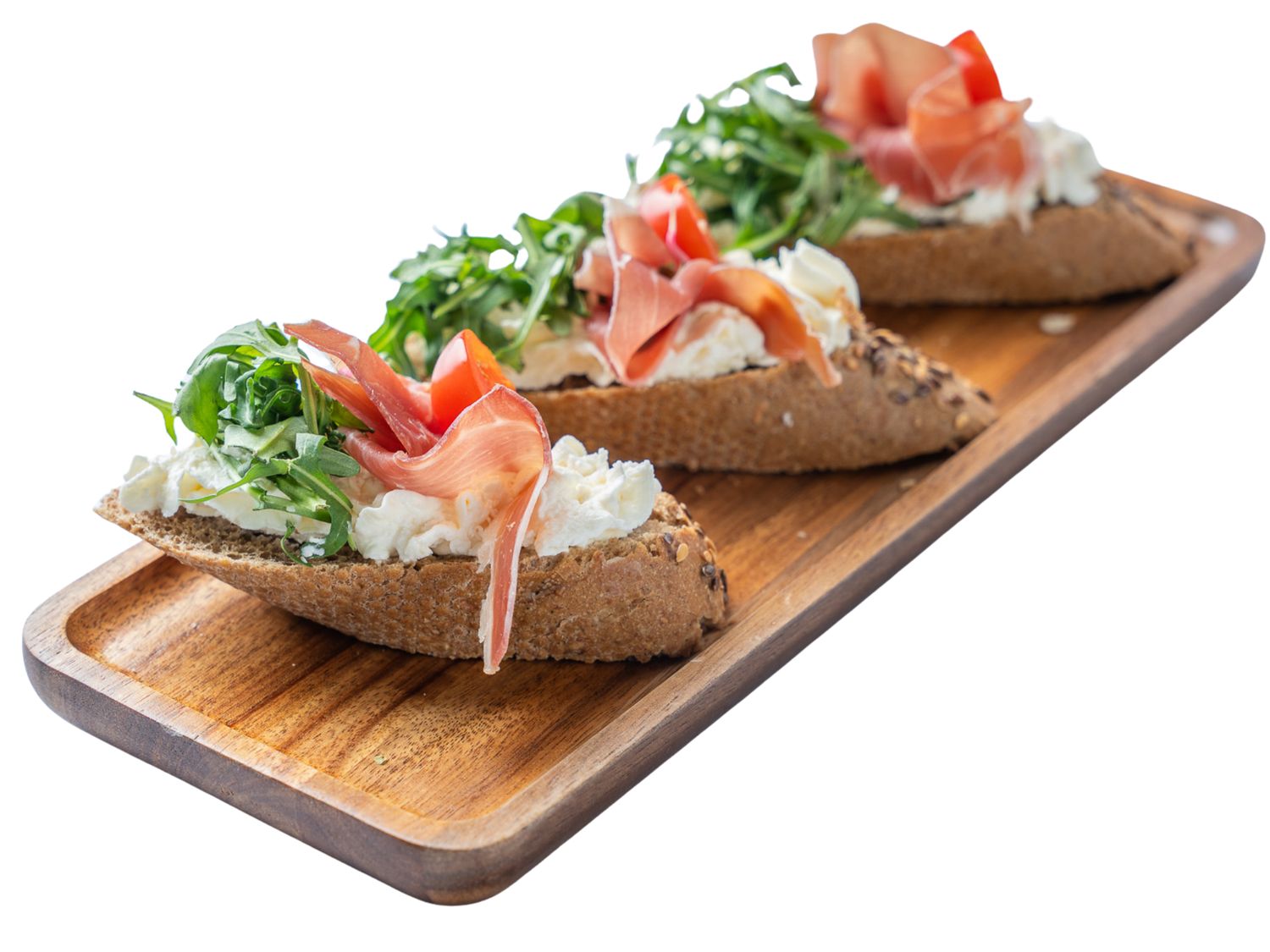 Mini kanapeczka z szynką dojrzewającą, rukolą i pomidorkami