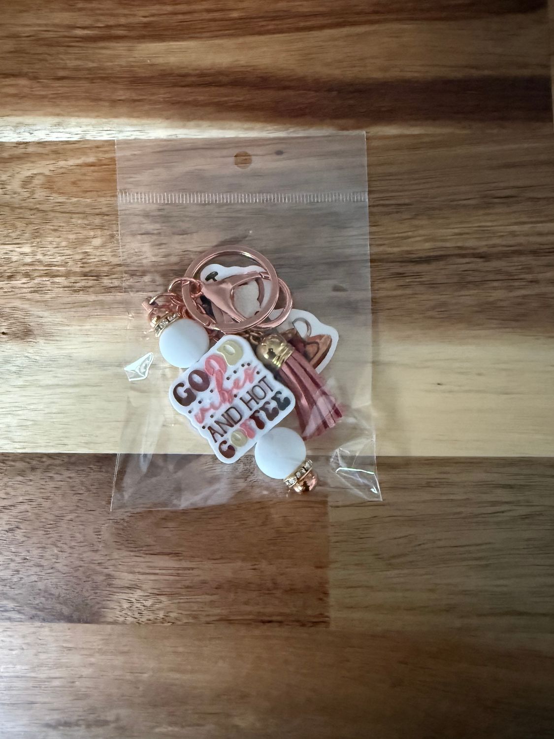 Sleutelhangers in een gezellige koffiethema