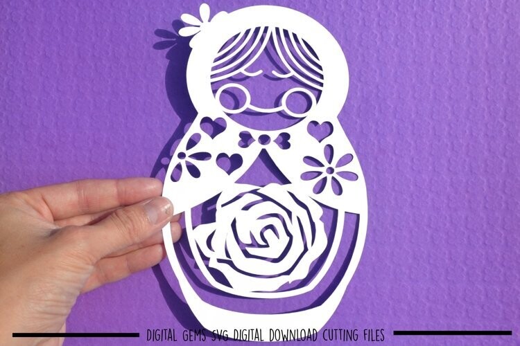 Russian doll paper cut design