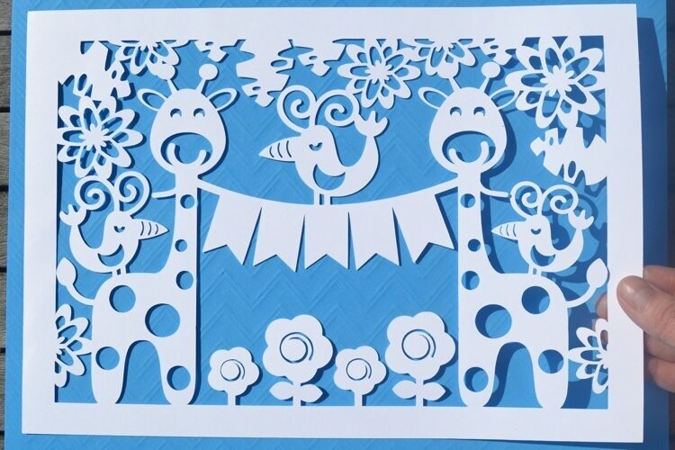 Giraffe paper cut design