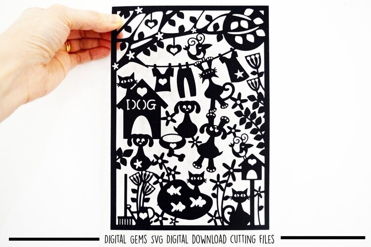 Dogs and Cats playing, paper cut design