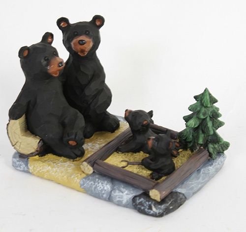 BEAR FAMILY PLAYING IN SANDBOX