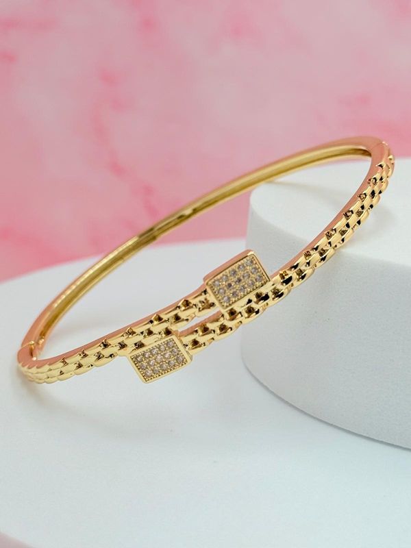 Pulsera rigída abierta con piedras blancas