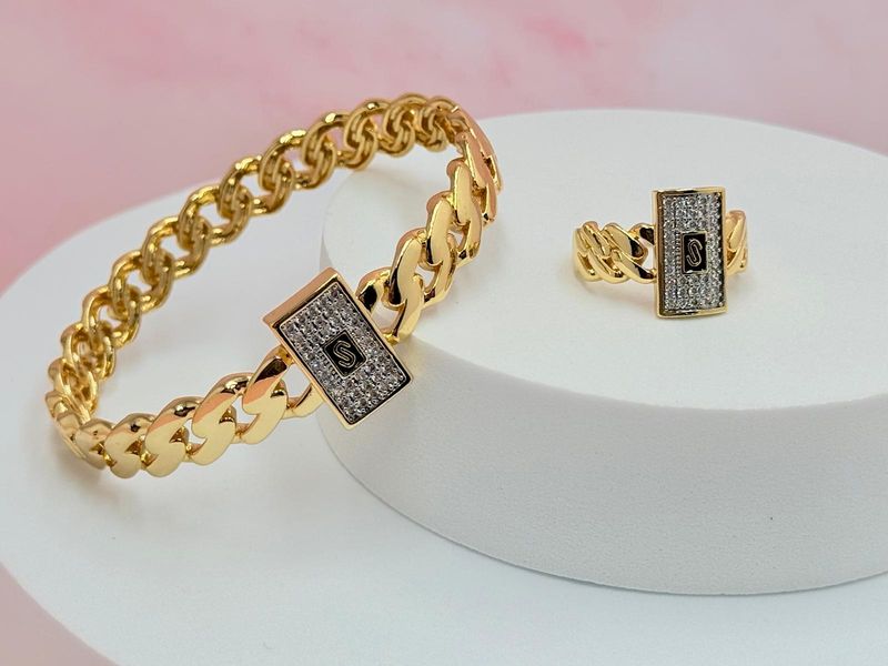 Pulsera rígida y anillo M.