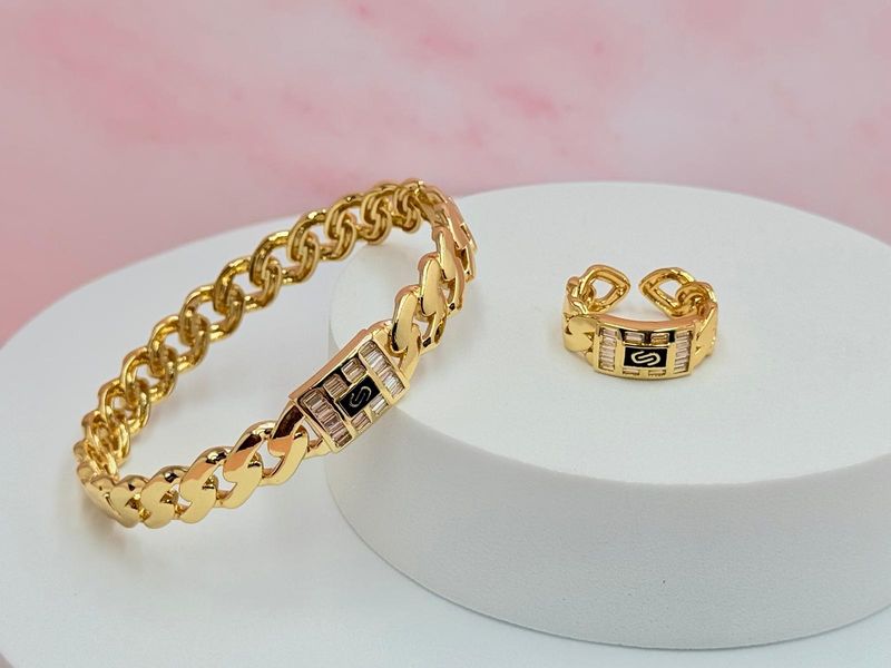 Pulsera rígida y anillo abierto M.