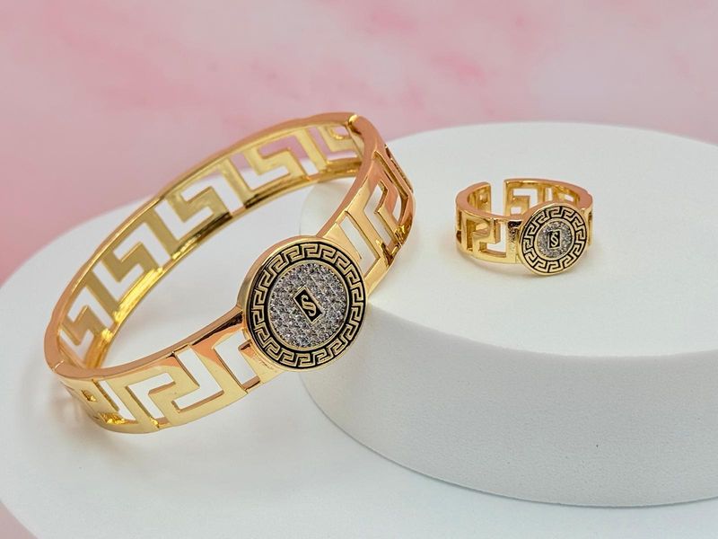 Pulsera rígida y anillo abierto M.