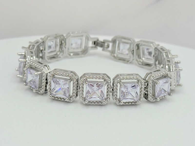 Pulsera rígida con bordes plateados