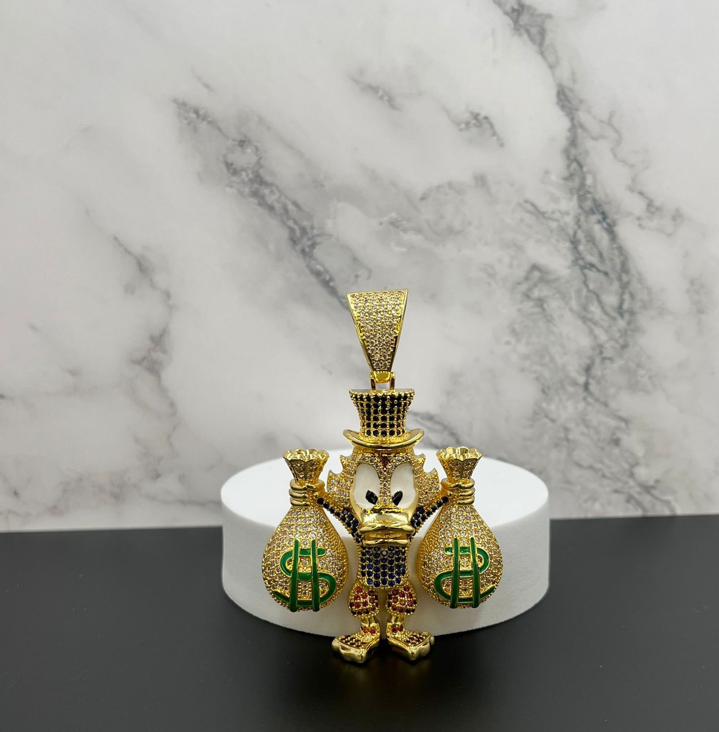 Dije laminado Mc Pato