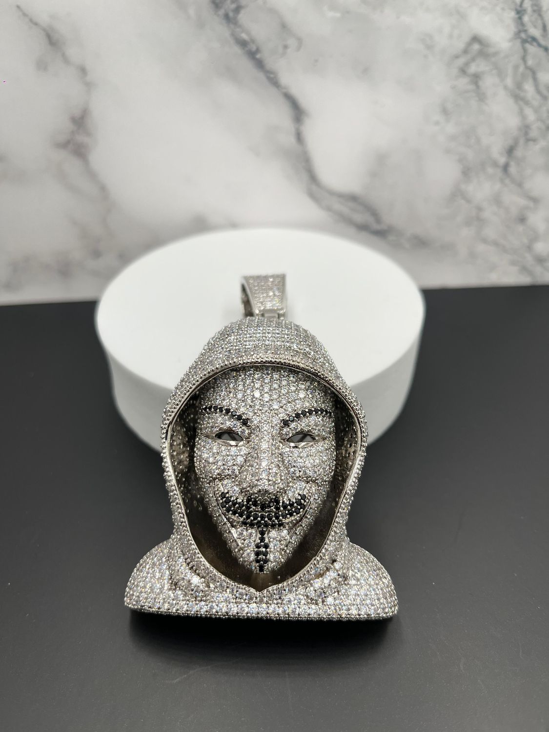 Dije laminado Anonymous