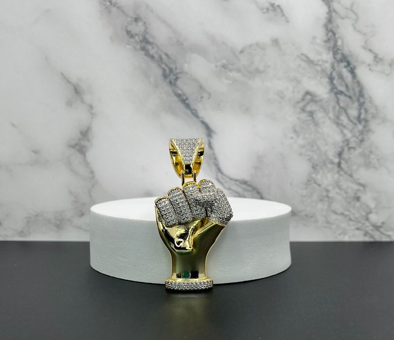 Dije laminado "Maño con puño"