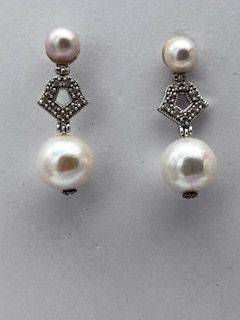 Indonesian pearl, zircon, and 925 silver earrings.