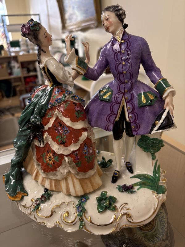 Figurine. Germany. Frankenthal. Porcelain. Colonial Couple Dancing, Wearing Red Dress &amp; Purple Coat. 9&quot;W x 9&quot;H