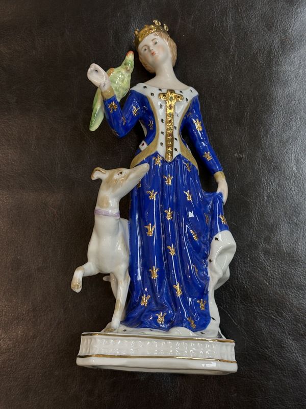 Figurine. Germany. Woman with Crown Bird and Dog. Blue with Gold Detailing.