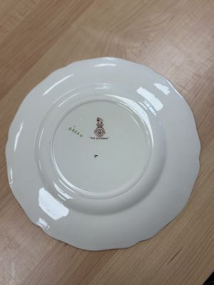 Porcelain. England. Dinner Plate. England. Royal Doulton. Brown Multicolor. Scalloped Rim.