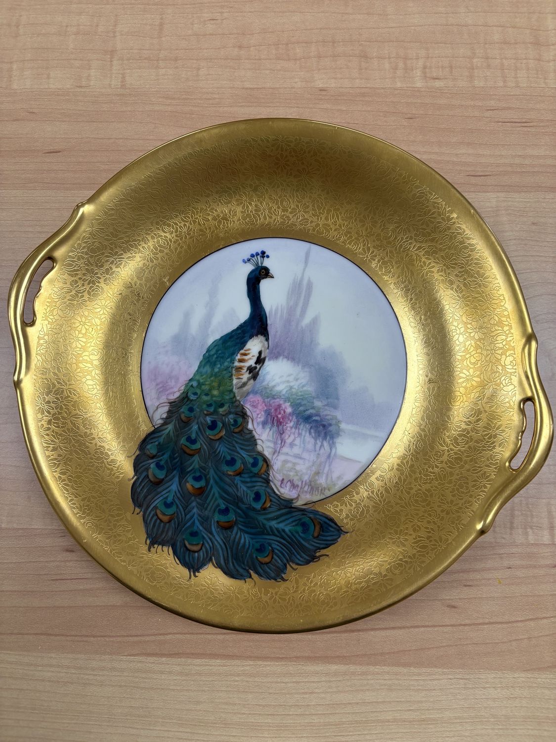 Ceramic. USA. Hutschenreuther. Early 20th Century Decorative Plate. Peacock in Garden, with Gold Gilt Border. 9.75&quot;W