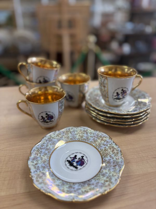 Porcelain. Czechoslovakia. 5 Cups and 5 Saucers. Gold Flowers and a Couple Wearing Purple and Blue.