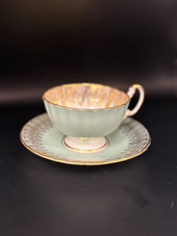 Porcelain. England. Aynsley. Tea Cup and Saucer. Gold on Mint Green Design. Pattern No. 2469. &quot;Orchid Gold&quot; by Doris Jones on Interior. 1964.