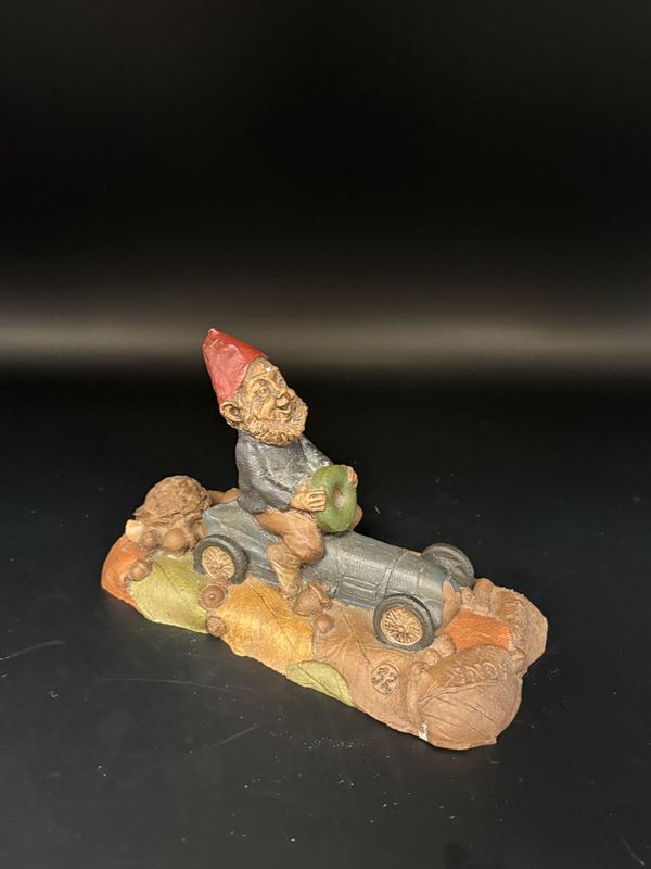 Sculpted Figure. USA. Tom Clark. Indy. Gnome Driving a Gray Indy Race Car. 1988. 3&#39;&#39;H