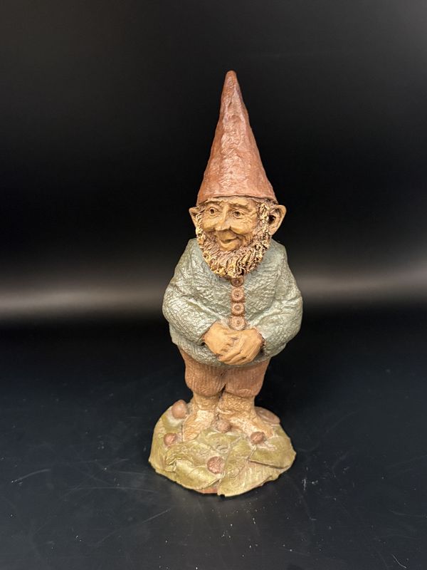 Sculpted Figure. USA. Tom Clark. Abednego. Gnome smiling and standing with hands held at his center. 1981. 7.25&#39;&#39; H.