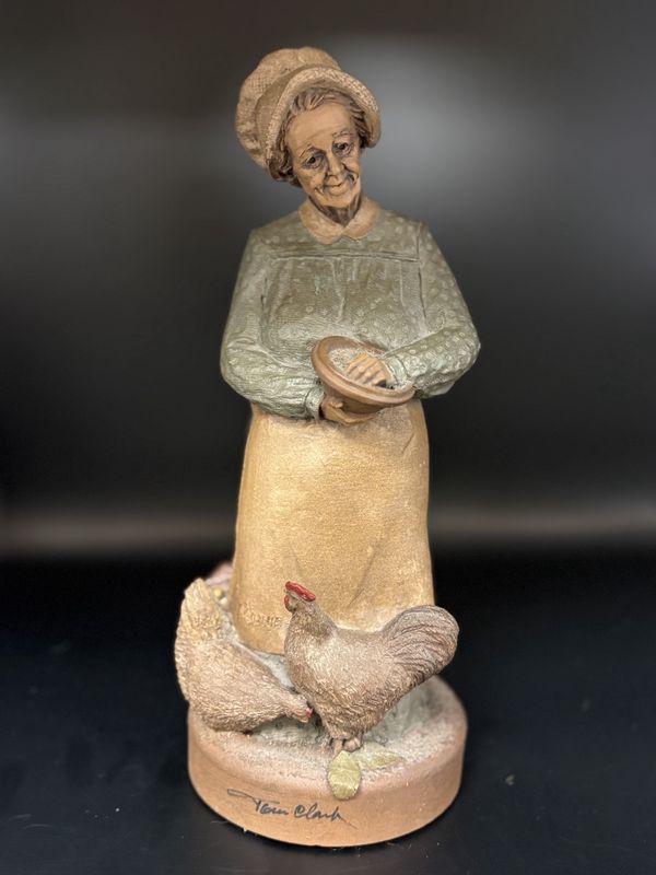 Sculpted Figure. USA. Tom Clark. Minnie. Signed. Woman Wearing Hat &amp; Apron, Feeding Chickens. 1992. 10&#39;&#39;H