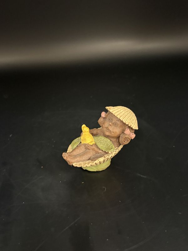 Sculpted Figure. USA. Tom Clark. Darcy. Small person sleeping in a sea shell while also wearing one as a hat. 2&#39;&#39;H.