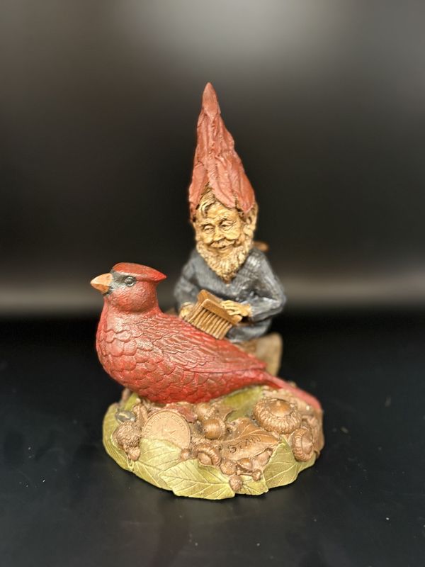 Sculpted Figure. USA. Tom Clark. Stan. Wood Spirit w/Tall Hat, Brushing a Cardinal. 1986. 7.5&#39;&#39;H
