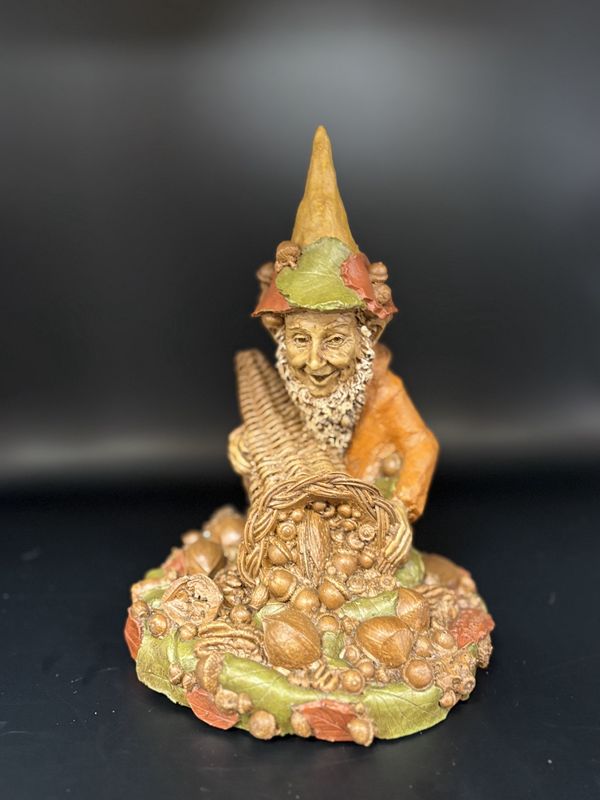 Sculpted Figure. USA. Tom Clark. Plenty. Gnome Holding Cornucopia of Acorns. 1983. 8&quot; H