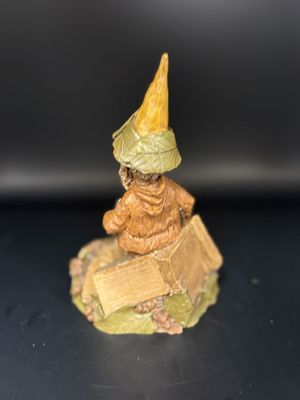 Sculpted Figure. USA. Tom Clark.  Pedro. Gnome Surrounded by a Pile of Cairn Newspapers. 1986. 6"H