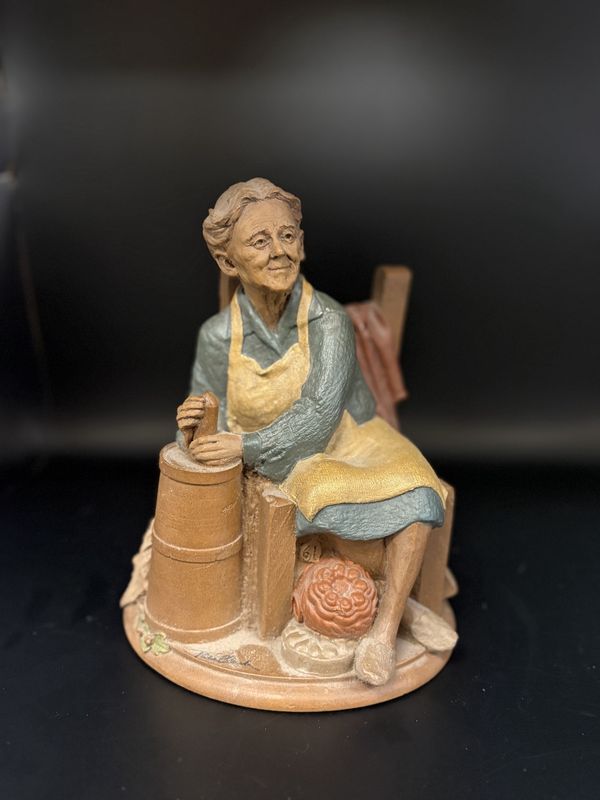 Sculpted Figure. USA. Tom Clark. Rachel. Woman in Blue Dress &amp; Yellow Apron Churning Butter. 1985. 8&#39;&#39;H