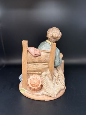 Sculpted Figure. USA. Tom Clark. Rachel. Woman in Blue Dress &amp; Yellow Apron Churning Butter. 1985. 8''H