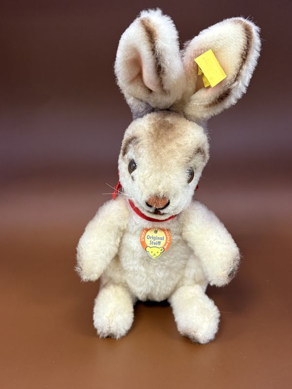 Plush. Germany. Steiff. Rabbit. &quot;Niki&quot;. Beige w/Red Bow, Sitting Upright. 7&quot;H