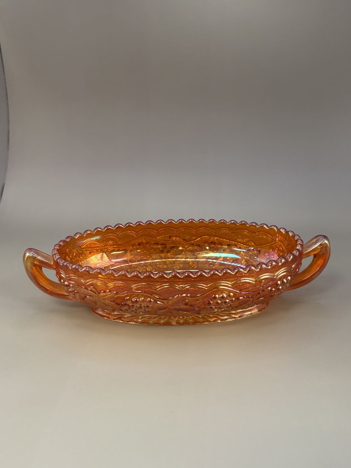 Glass. USA. Indiana Carnival Glass. Bowl. Oval w/Handles. Grape Pattern w/Beaded Edge. Marigold. 8&quot;W