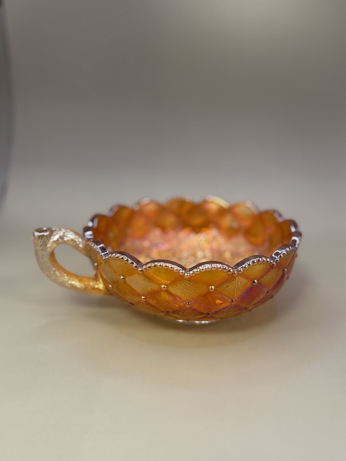 Glass. USA. Carnival Glass Dish w/Handle. Marigold. 6.75&quot;W