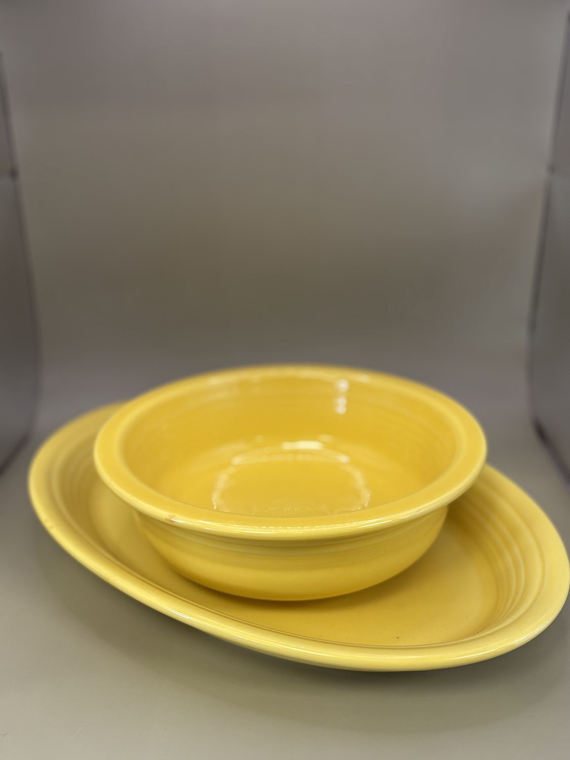 Dinnerware Set. USA. Homer Laughlin. Fiestaware. Sunflower Yellow. 2-Piece Companion Set. Platter &amp; Serving Bowl