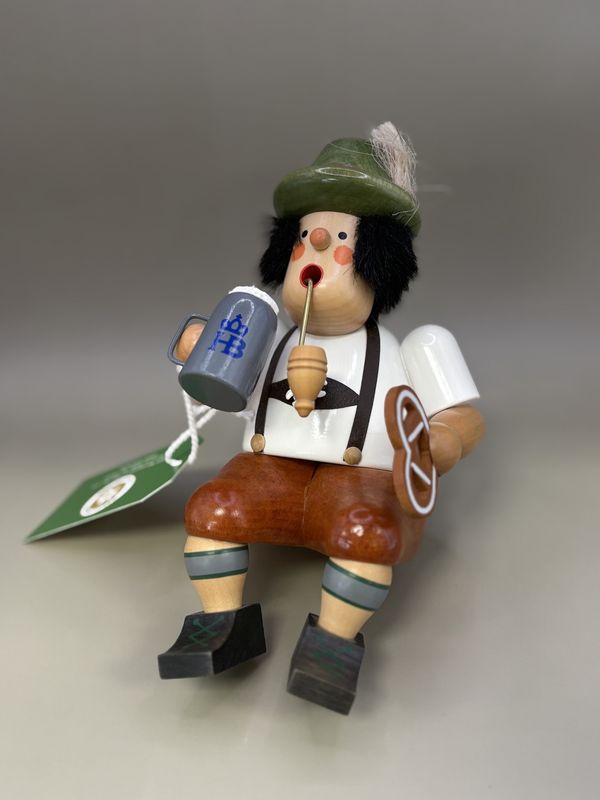 Smoker. Germany. Christian Ulbricht. Shelf-sitter: German man with pretzel and stein. 6.5&quot;H