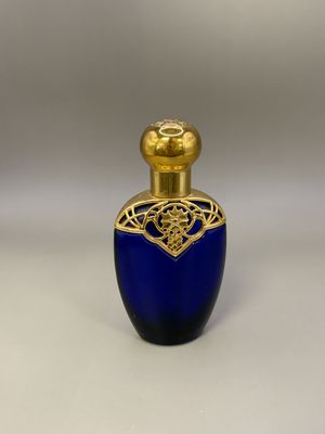 Glass. USA. Avon. Mesmerize Cologne Bottle. Cobalt Blue w/Gold Lid. 1990s. 5''H