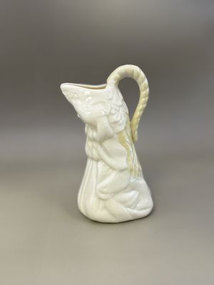 Porcelain. Ireland. Belleek. Girl-shaped Pitcher/Creamer. 5"H. Green Mark