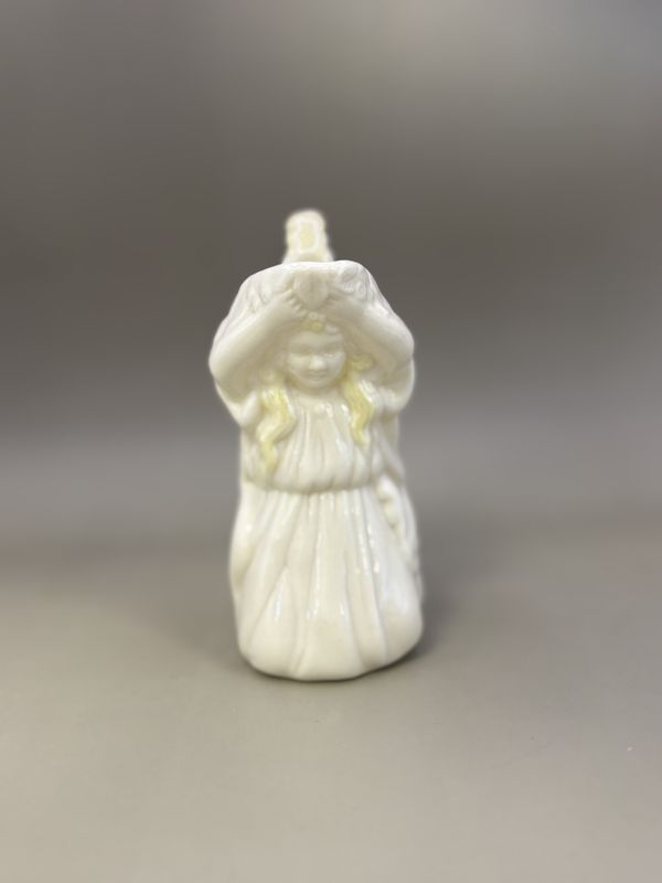 Porcelain. Ireland. Belleek. Girl-shaped Pitcher/Creamer. 5&quot;H. Green Mark