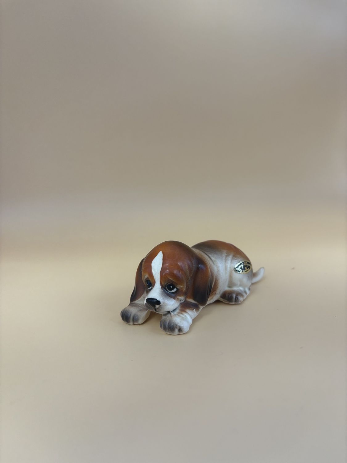 Porcelain. Japan. Laying Puppy Dog. Japan. Josef.