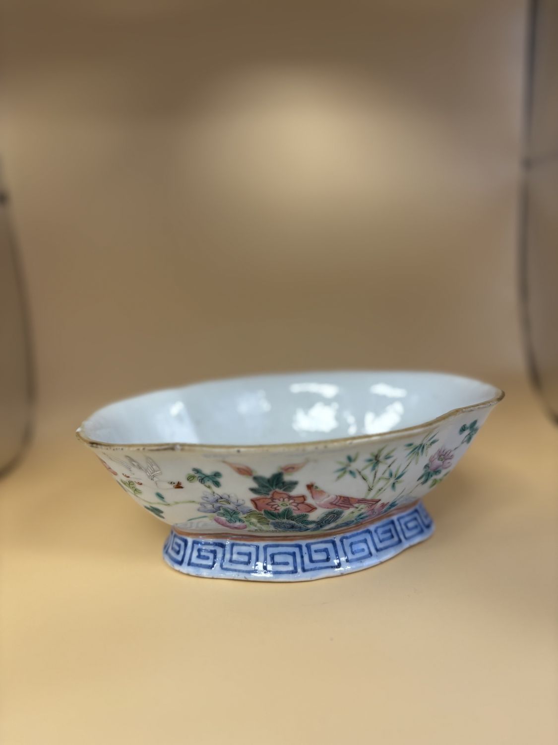 Porcelain. Chinese Famille Rose Footed Bowl. Rooster and Hen Motif with Floral and Bamboo Elements. Quatrefoil Pedestal.