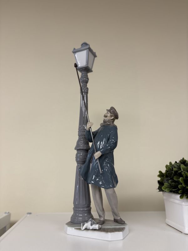 Figurine. Spain. Lladro. Lamplighter. 19&quot;H.