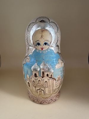 Doll. Russia. Ceprueb Nocag. 7-Piece Matryoshka (Nesting Doll)  Set. Wood Burned Design &amp; Hand-painting. Beige, Pale Pink, Teal &amp; Silver. 8"H