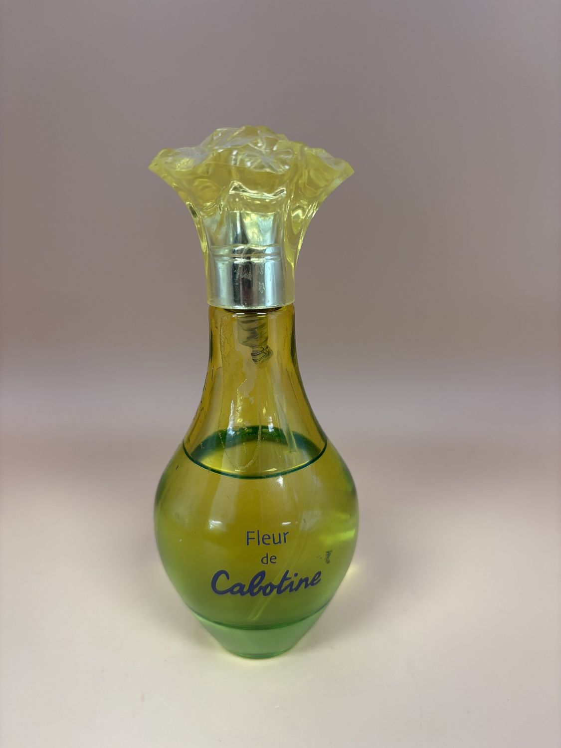 Glass.  France. Gres. Vintage French Eau de Toilette. Fleur de Cabotine. Green/Yellow Bottle. 5&quot;H