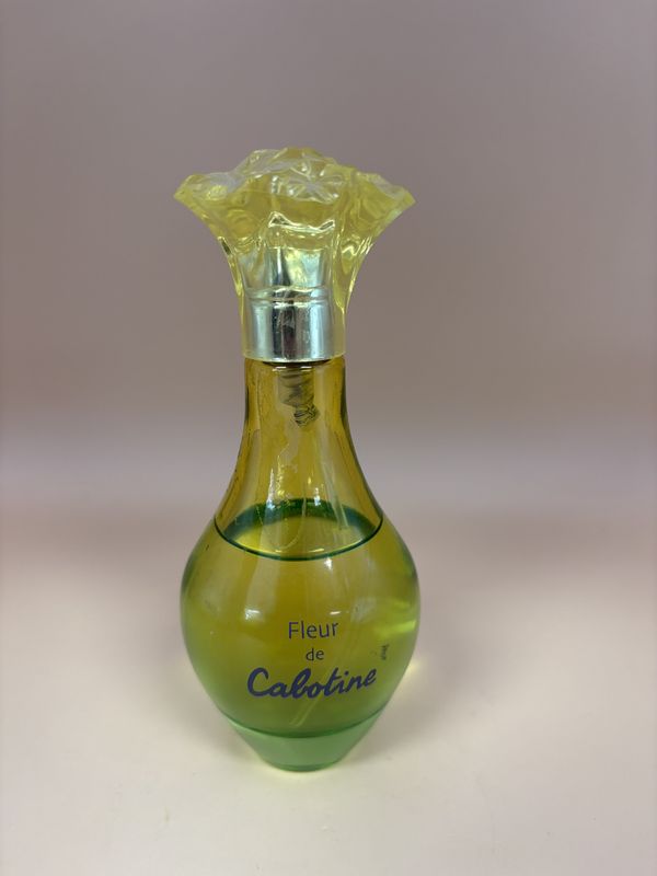 Glass.  France. Gres. Vintage French Eau de Toilette. Fleur de Cabotine. Green/Yellow Bottle. 5&quot;H