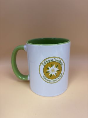 Ceramic. Edelweiss Heirlooms Mug. White w/Bright Green Interior. 3.75"H