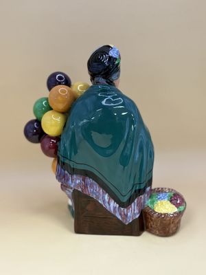 Figurine. England. Royal Doulton. Porcelain. Old Balloon Seller. Female. 8"H