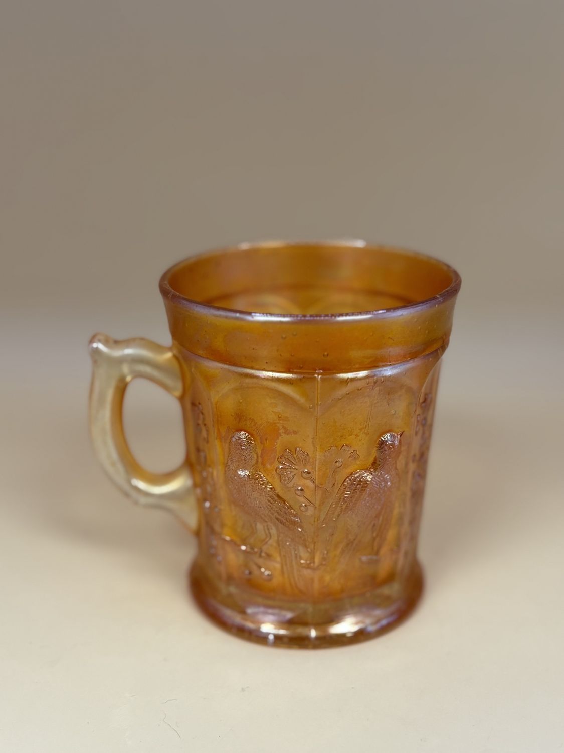 Glass. USA. Northwood. Carnival Glass Handled Cup w/Birds &amp; Flowers. Marigold. 3.75&quot;H