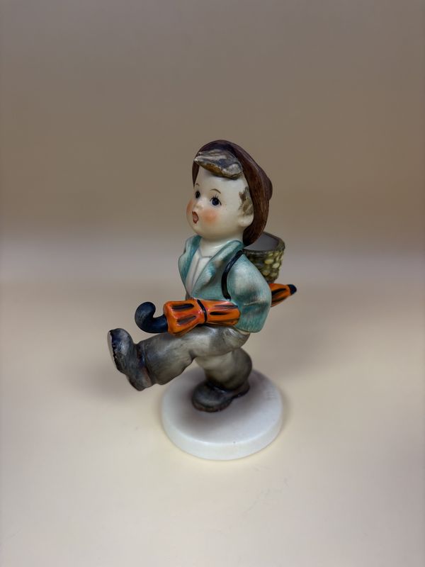 Figurine. Germany. Hummel. #79 &quot;Globe Trotter&quot;. TMK 5 (1972-1979).  5.13&quot;H
